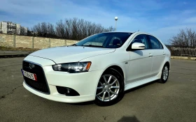 Обява за продажба на Mitsubishi Lancer УНИКАЛЕН/КЛИМАТРОН/МУЛТИВОЛАН/1.6i ~12 799 лв. - изображение 1