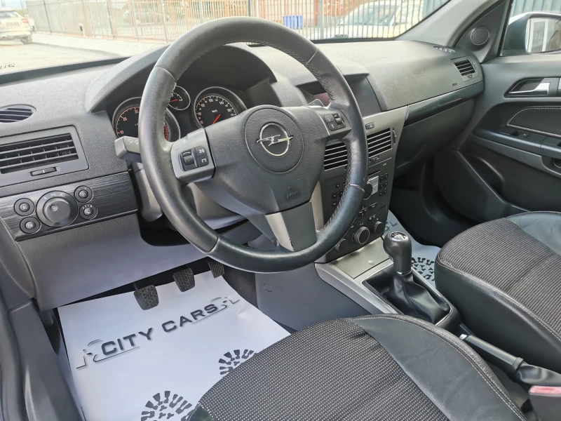 Opel Astra 1.7 CDTI, снимка 11 - Автомобили и джипове - 47555453