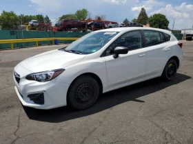 Subaru Impreza 2.0L 4 All wheel drive