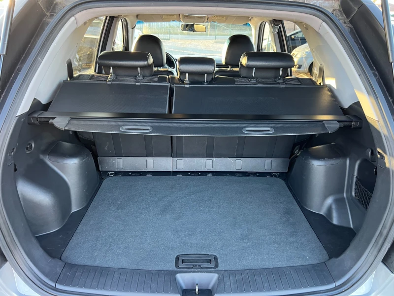 Kia Sportage 2.0 4x4, снимка 15 - Автомобили и джипове - 52755772