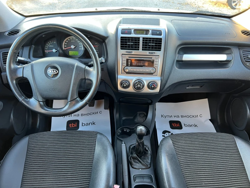 Kia Sportage 2.0 4x4, снимка 12 - Автомобили и джипове - 52755772
