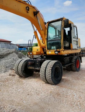 Багер Hyundai ROBEX 140W-7, снимка 3