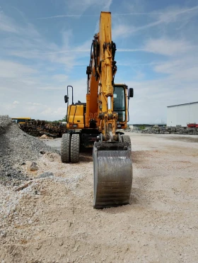 Багер Hyundai ROBEX 140W-7, снимка 2
