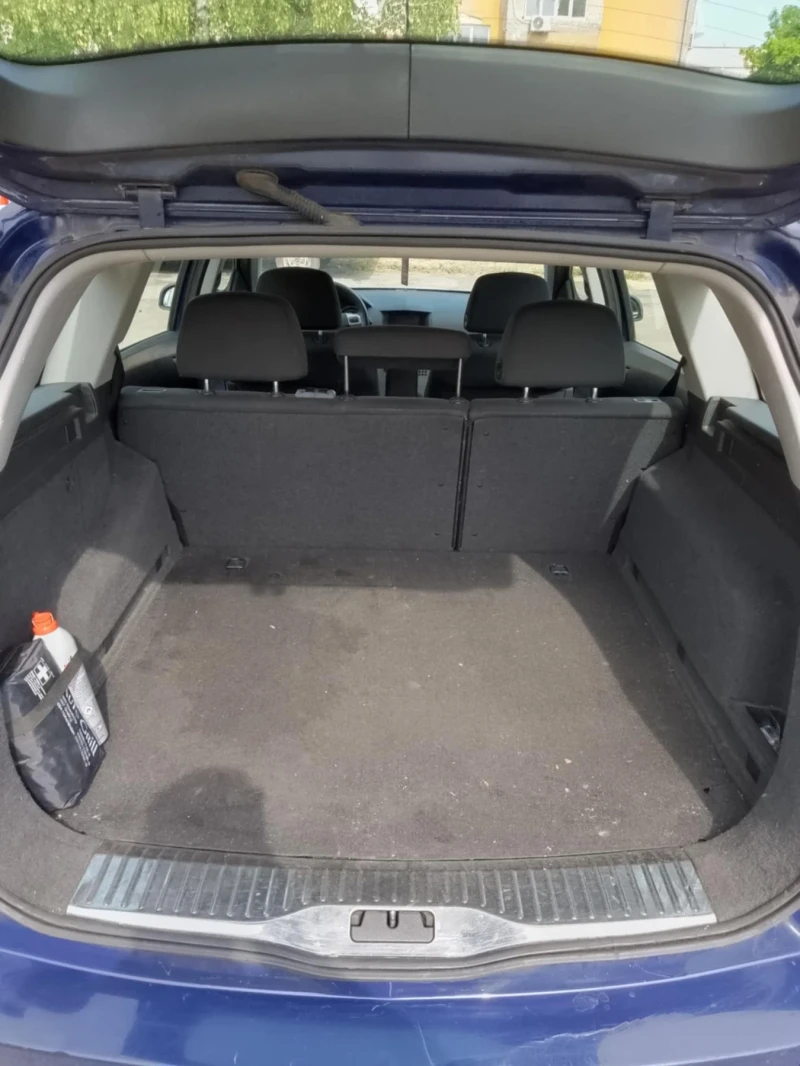 Opel Astra, снимка 12 - Автомобили и джипове - 52960559