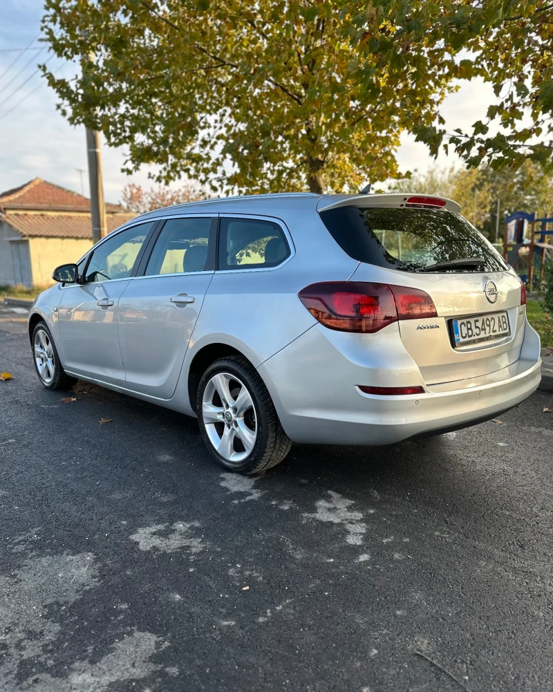 Opel Astra 1.7 CDTI, NAVI, снимка 4 - Автомобили и джипове - 52671259