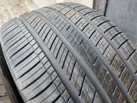 Гуми Всесезонни 285/45R21, снимка 5 - Гуми и джанти - 40459650