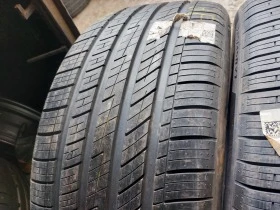 Гуми Всесезонни 285/45R21, снимка 7 - Гуми и джанти - 40459650