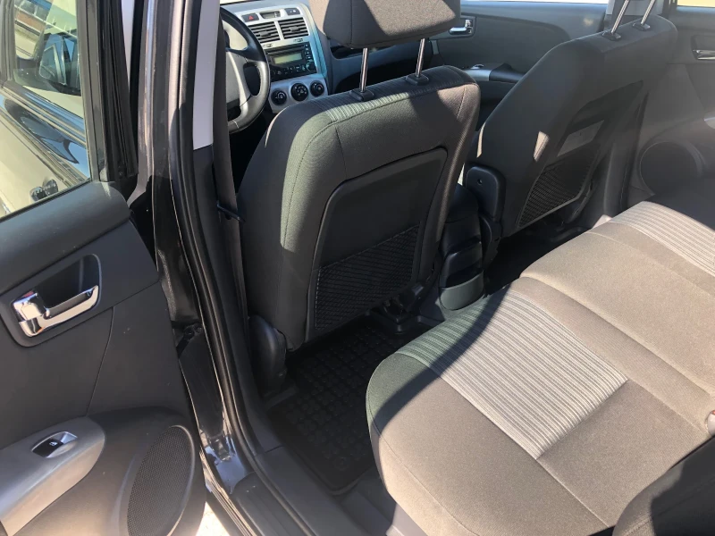 Kia Sportage 2.0 CRDI 4WD, снимка 8 - Автомобили и джипове - 51848605