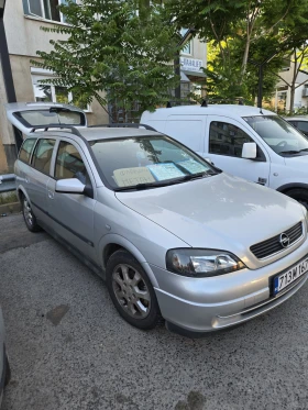     Opel Astra 156000 .  .