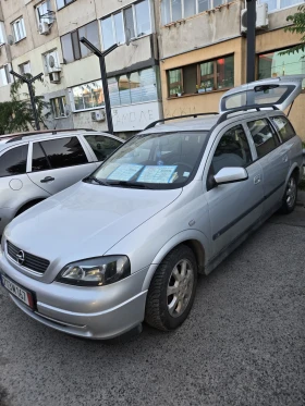     Opel Astra 156000 .  .