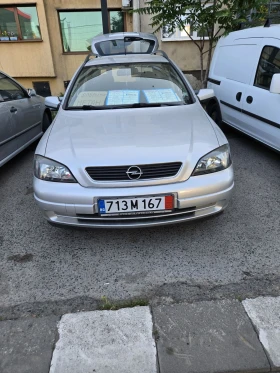     Opel Astra 156000 .  .