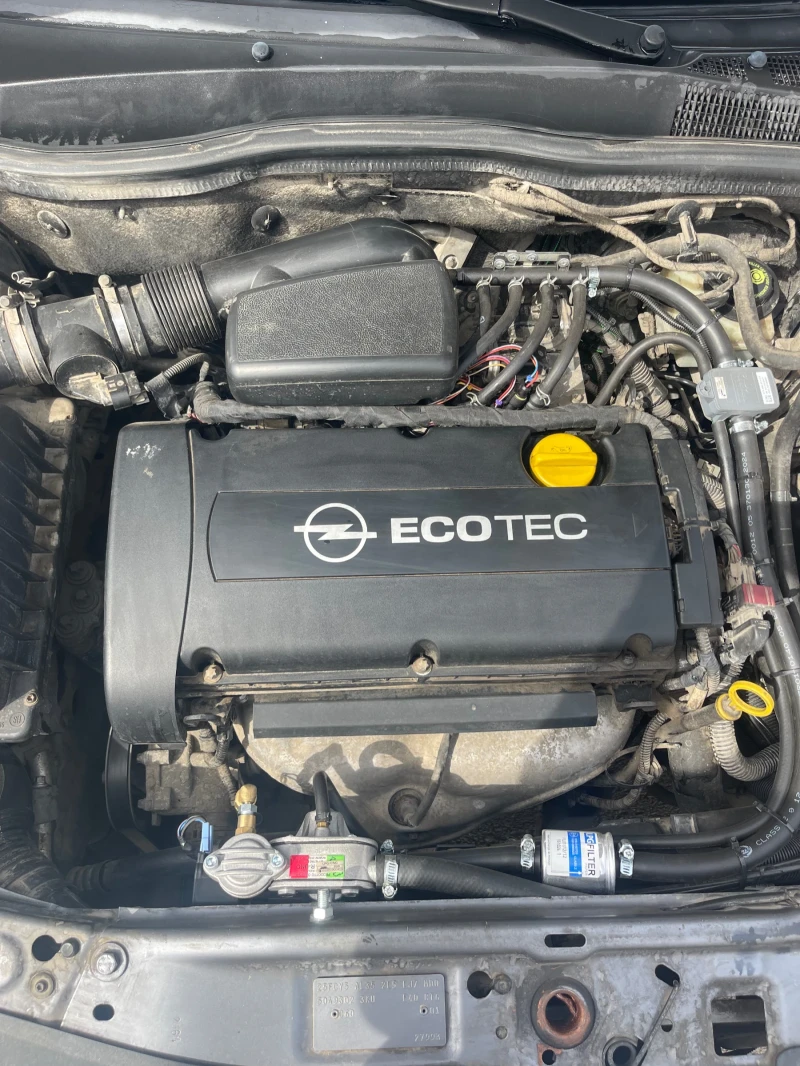 Opel Astra 1.6 бензин газ, снимка 9 - Автомобили и джипове - 53140174