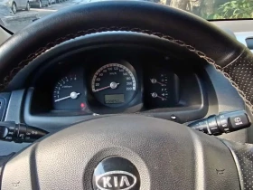 Kia Sportage  2.0 / газ / 4х4, снимка 11