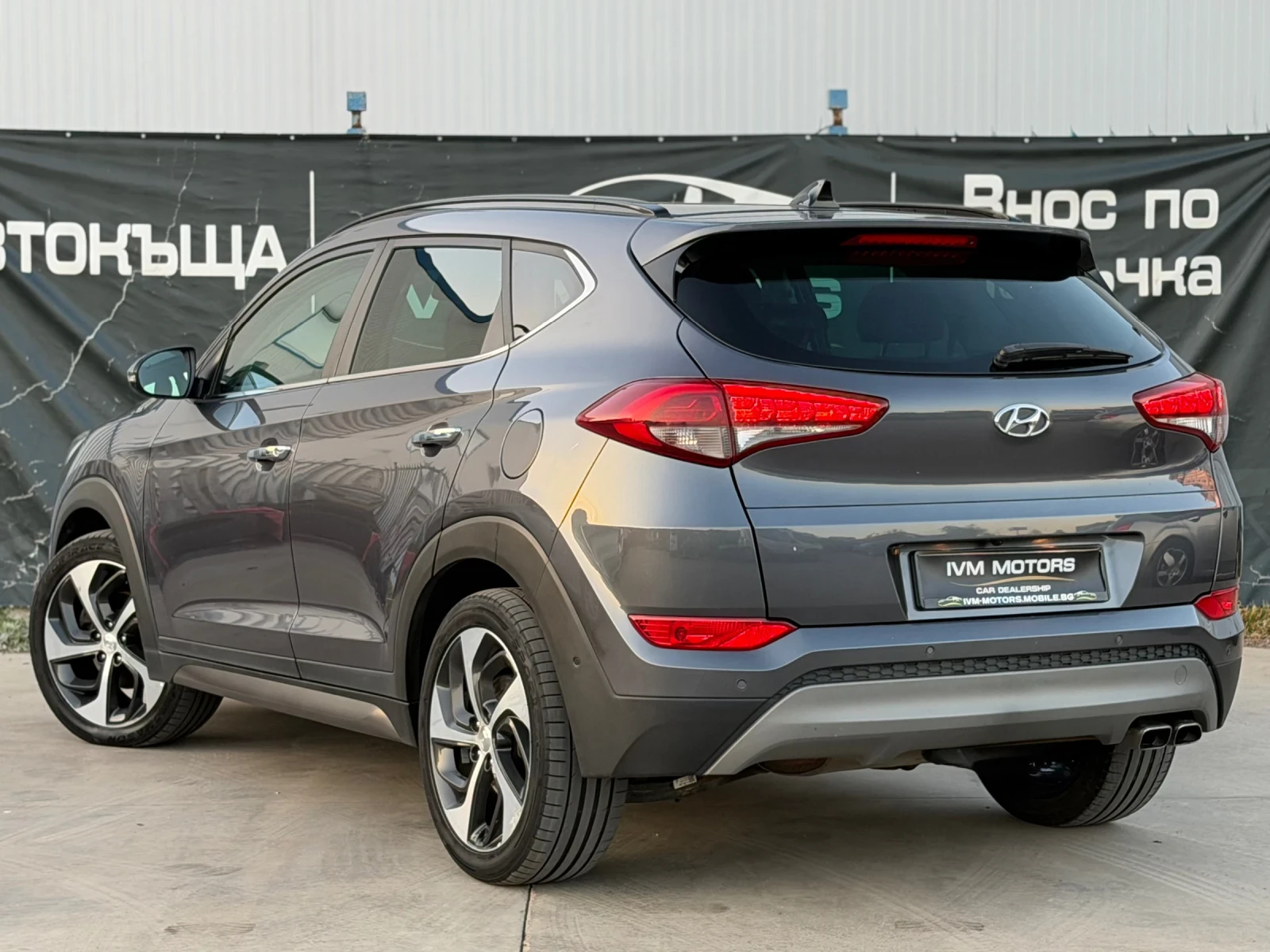 Hyundai Tucson 2.0CRDI* 4X4* PREMUIM* АВТОМАТИК, снимка 4 - Автомобили и джипове - 56121722