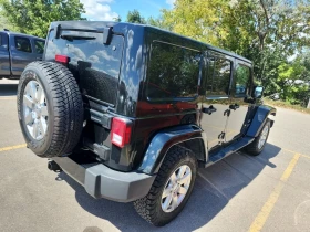 Обява за продажба на Jeep Wrangler * SAHARA * CARFAX * БЕЗ ПЪРВОНАЧАЛНА ВНОСКА ~35 200 лв. - изображение 2 | Auto.bg Обява за продажба на Jeep Wrangler * SAHARA * CARFAX * БЕЗ ПЪРВОНАЧАЛНА ВНОСКА ~35 200 лв. - изображение 2