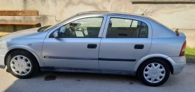 Opel Astra 1.8 16v Avtomat, Хечбек, Разград - 1555 € / 3041.32 лв. - 30147913 4