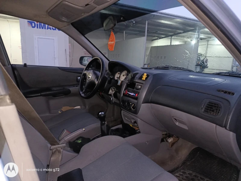 Mazda 323 1.6/90/газ, снимка 14 - Автомобили и джипове - 48371099