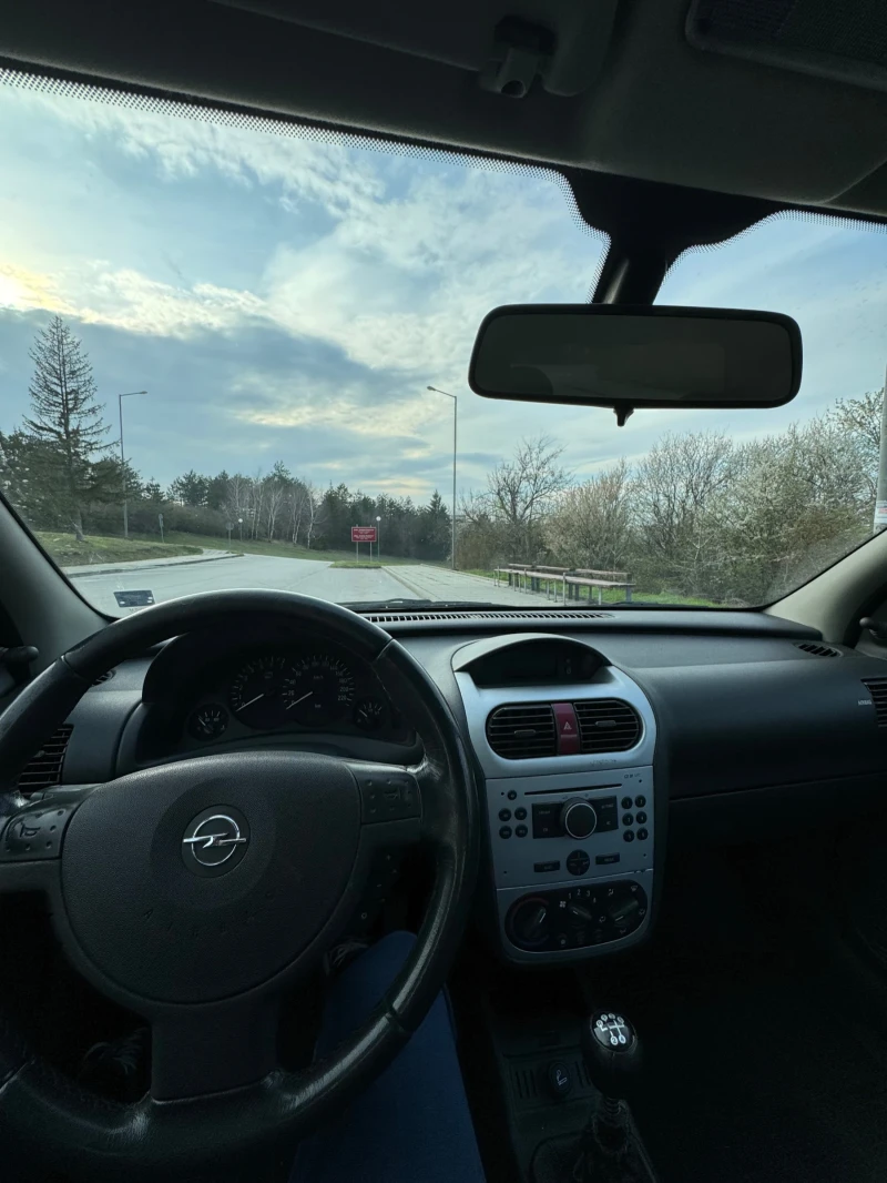 Opel Corsa 1.2 twinport, снимка 12 - Автомобили и джипове - 53258874