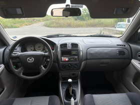 Mazda 323 1.6i, снимка 8 - Автомобили и джипове - 46073122
