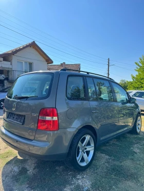 VW Touran 1.9      | Mobile.bg    3
