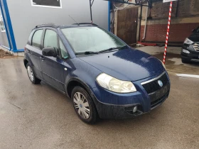 Fiat Sedici 1.6i Газ 4х4 - 2400 € / 4693.99 лв. - 77409695 6