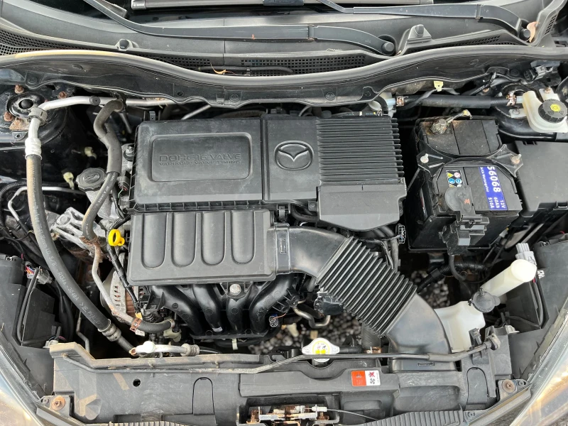 Mazda 2 1.3 75 коня, снимка 14 - Автомобили и джипове - 51129945