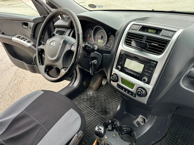 Kia Sportage, снимка 11 - Автомобили и джипове - 48148591