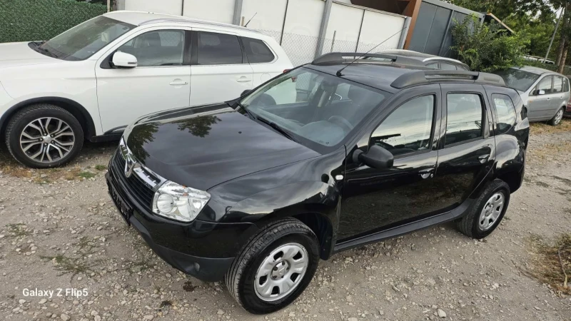 Dacia Duster 1.6i - LPG, снимка 13 - Автомобили и джипове - 51439462