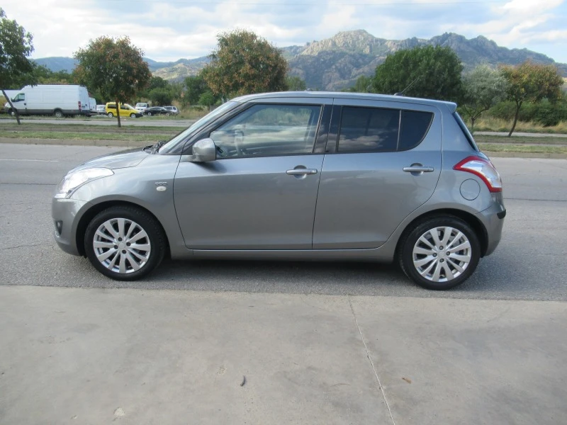 Suzuki Swift 1.3DDIS 75ps * ПЕРФЕКТЕН* , снимка 2 - Автомобили и джипове - 46751788