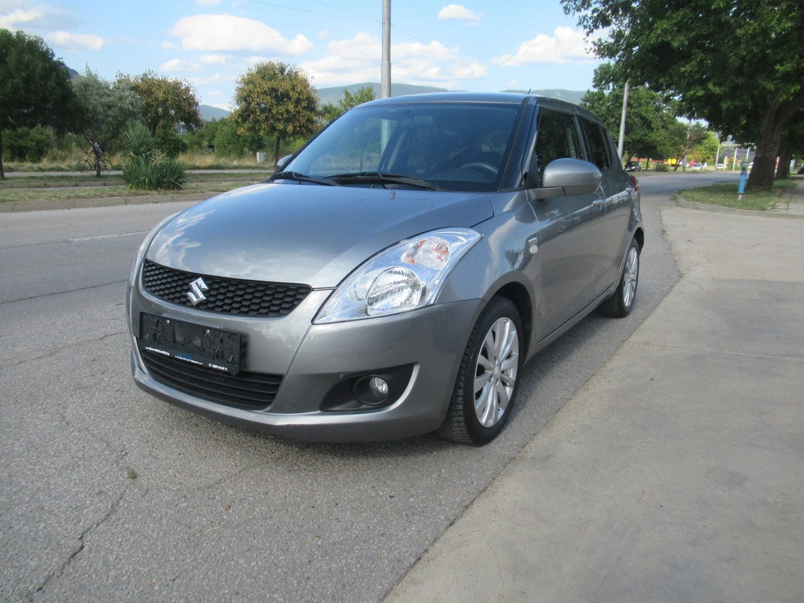 Suzuki Swift 1.3DDIS 75ps * ПЕРФЕКТЕН* , снимка 1