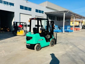 Мотокар Mitsubishi Виличен изравнител и позиционер на вилиците, снимка 1