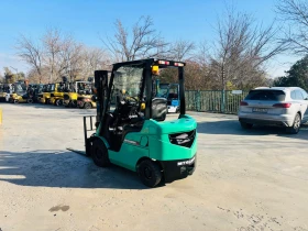 Мотокар Mitsubishi Виличен изравнител и позиционер на вилиците, снимка 2