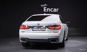 BMW 740 XDRIVE* M SPORT* HEADUP* 360* DIGITAL* PANO* ОБДУХ, снимка 4
