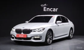 BMW 740 XDRIVE* M SPORT* HEADUP* 360* DIGITAL* PANO* ОБДУХ, снимка 1