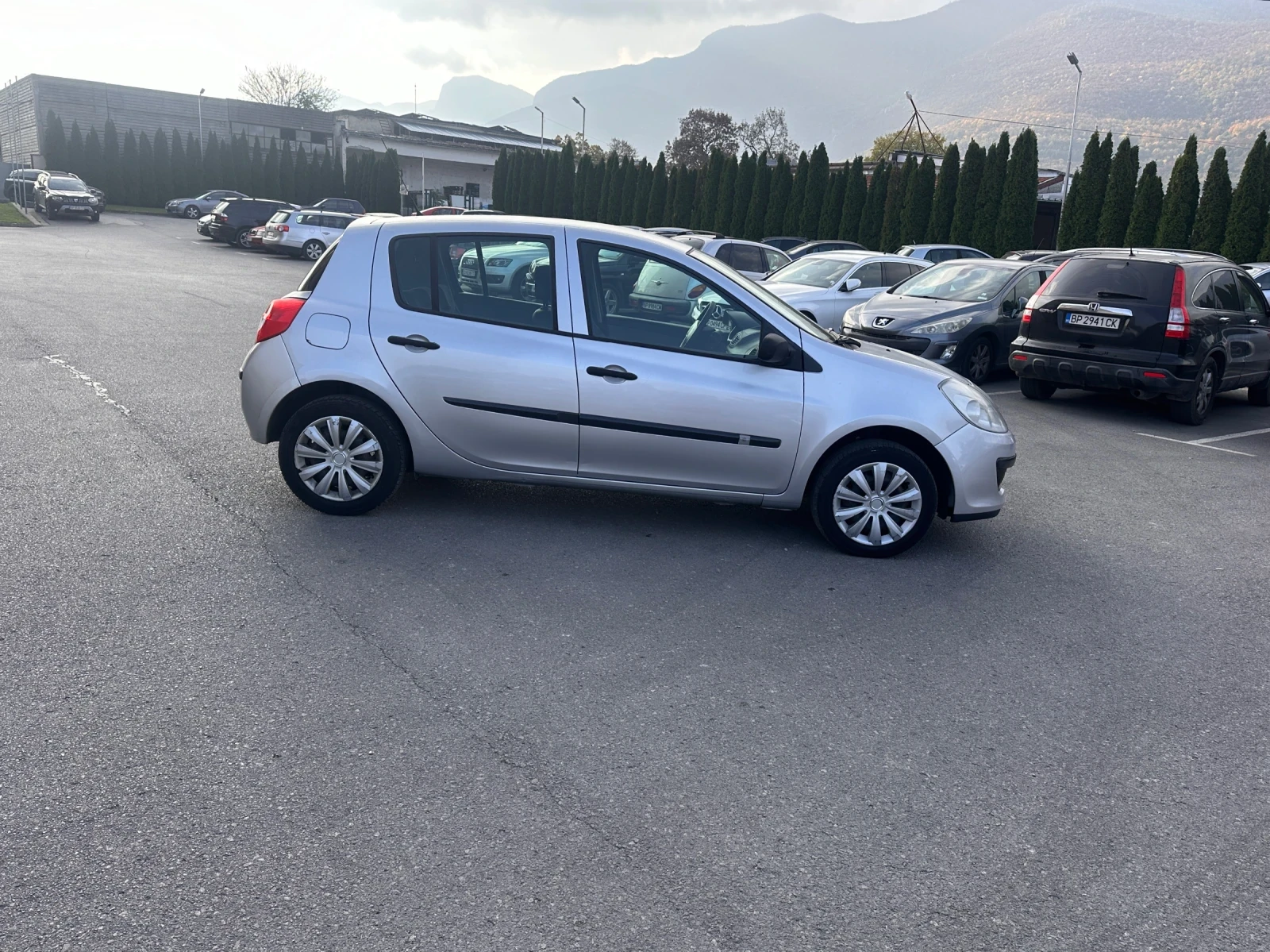 Renault Clio 1.2i - КЛИМАТИК - РЕАЛНИ КИЛОМЕТРИ - изображение 4