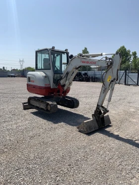 Багер Takeuchi TB230