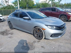 Honda Civic 2.0L I-4 DOHC, VVT, 158HP Front Wheel Drive