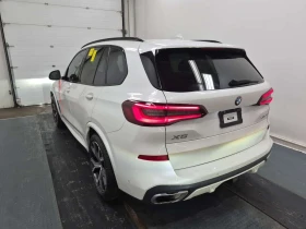 BMW X5 * xDrive40i * ПОДГРЕВИ * ПАНО * 2 КЛЮЧА * CARFAX *, снимка 4
