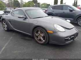 Porsche Cayman 2.7L H-6 DOHC, VVT, 245HP Rear Wheel Drive