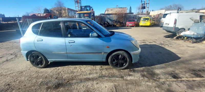 Daihatsu Sirion, снимка 7 - Автомобили и джипове - 48377021