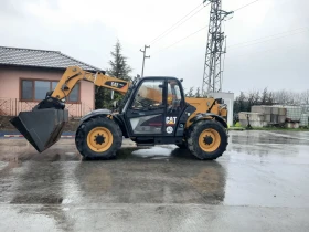 Телескопичен товарач Caterpillar ТН 407, снимка 1
