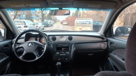 Mitsubishi Outlander 2.4i ГАЗОВ ИНЖЕКЦИОН, снимка 11