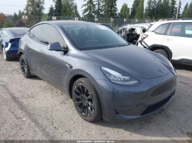 Tesla Model Y U   U All Wheel Drive