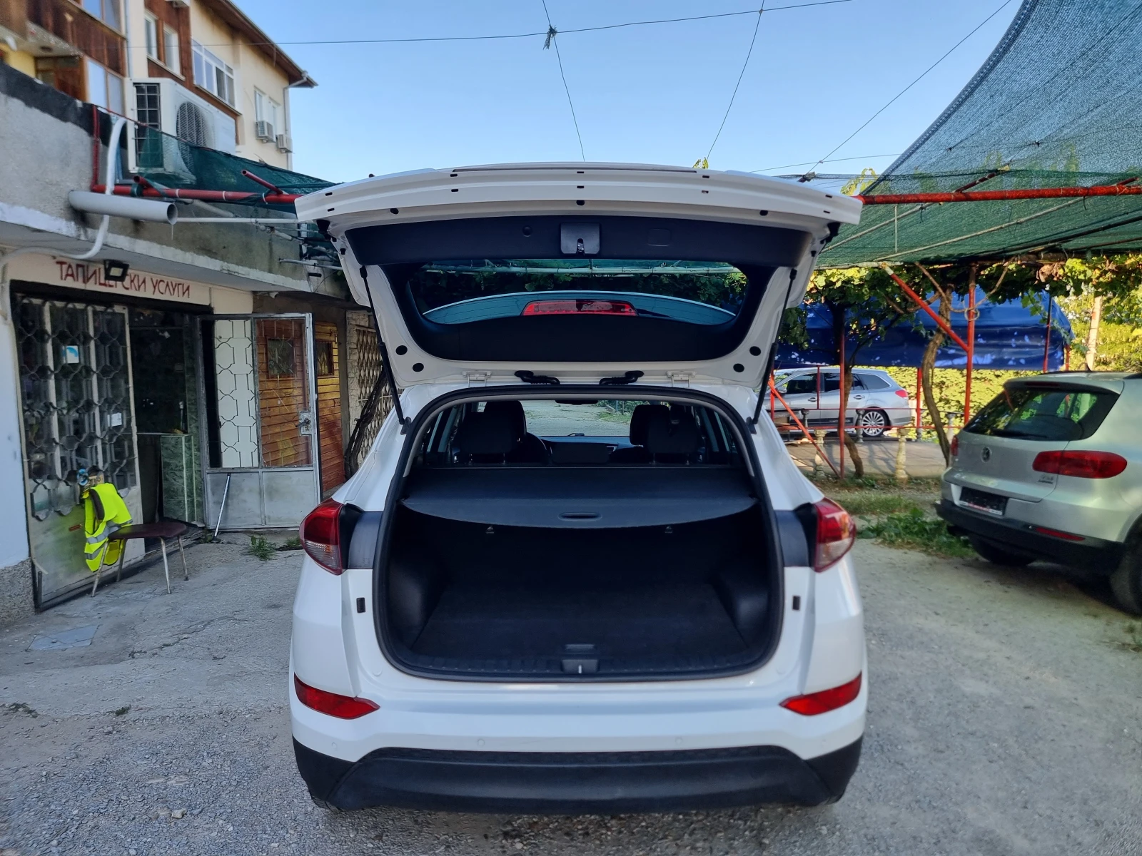 Hyundai Tucson 1.7CRDI* 141* AVTOMAT * KAMERA* NAVI* , снимка 12 - Автомобили и джипове - 55251731