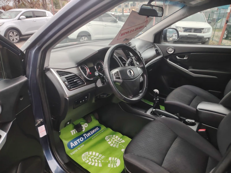 SsangYong Korando 2.0i, снимка 7 - Автомобили и джипове - 47945954