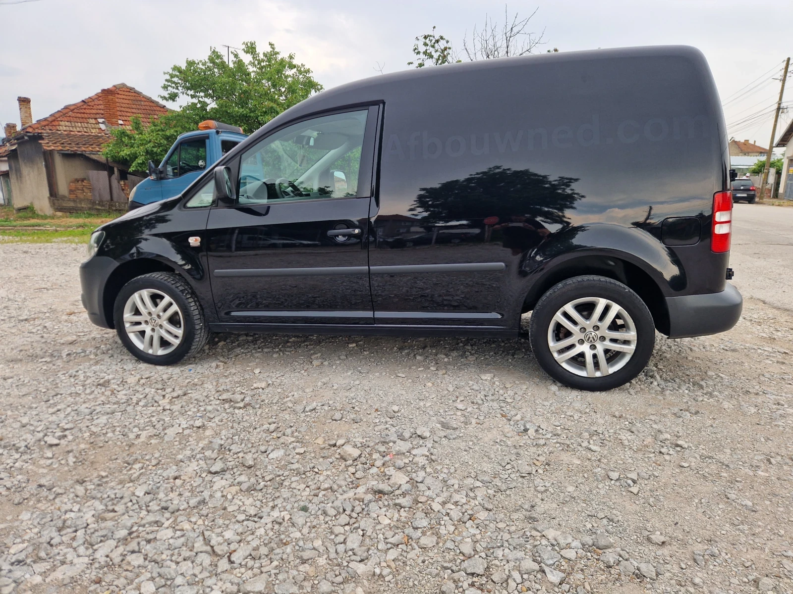 VW Caddy 1.6 TDI, снимка 8 - Автомобили и джипове - 54801576