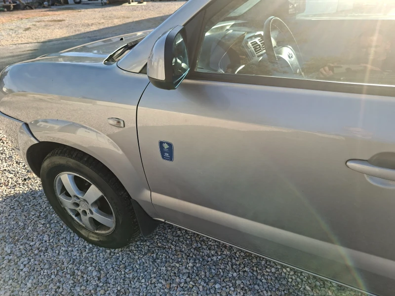 Hyundai Tucson  2.0 CRDI, снимка 7 - Автомобили и джипове - 52109608