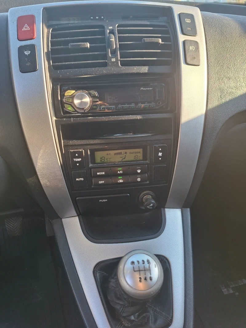 Hyundai Tucson  2.0 CRDI, снимка 11 - Автомобили и джипове - 52109608