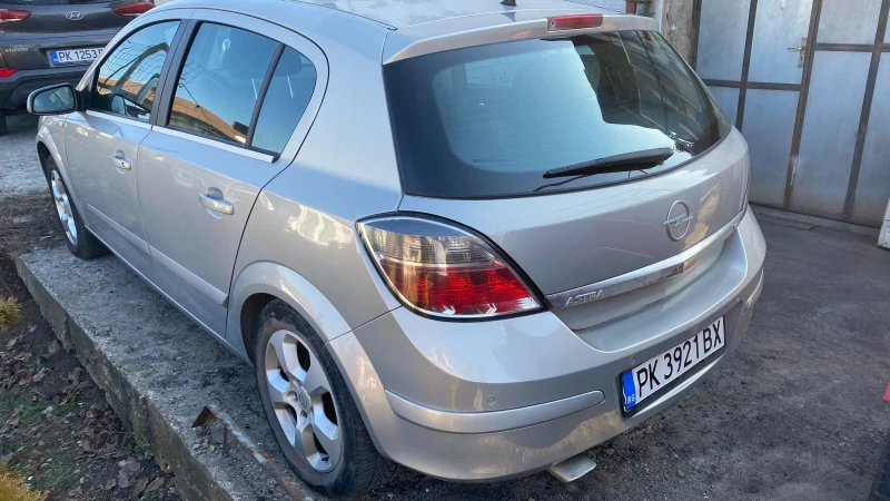 Opel Astra, снимка 14 - Автомобили и джипове - 49025558