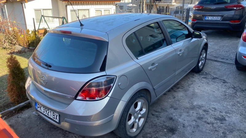 Opel Astra, снимка 15 - Автомобили и джипове - 49025558